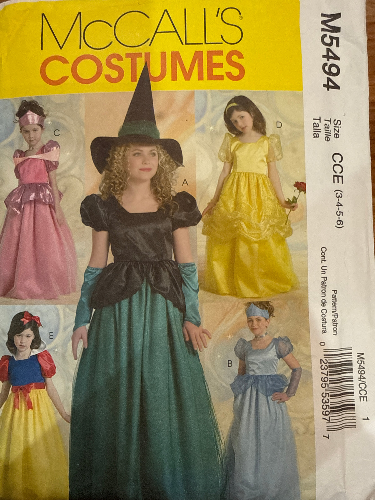 McCall’s M5494 sewing pattern envelope showing children’s princess and witch costumes.