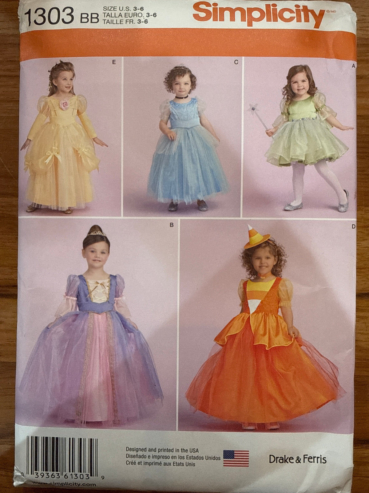 Simplicity 1303 sewing pattern envelope showing children’s princess, fairy, and witch costume dresses