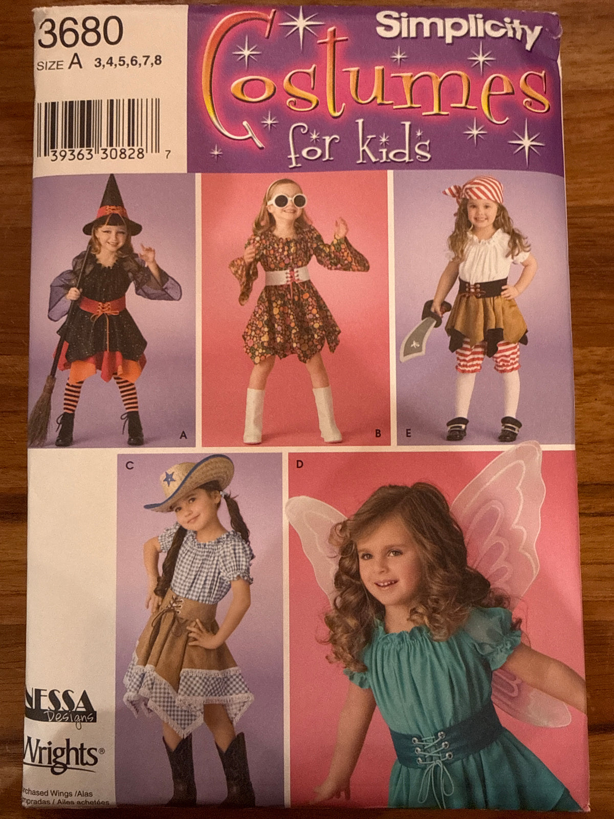 Simplicity 3680 sewing pattern envelope showing children’s witch, retro, cowgirl, fairy, and pirate costumes.