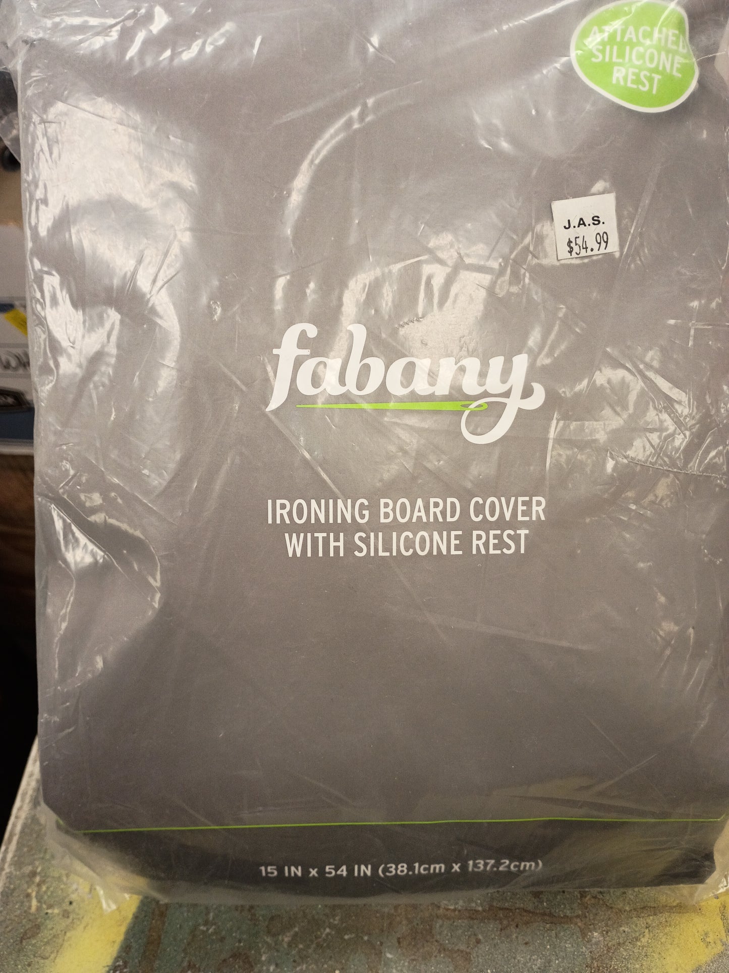 Ironing board cover with silicone rest