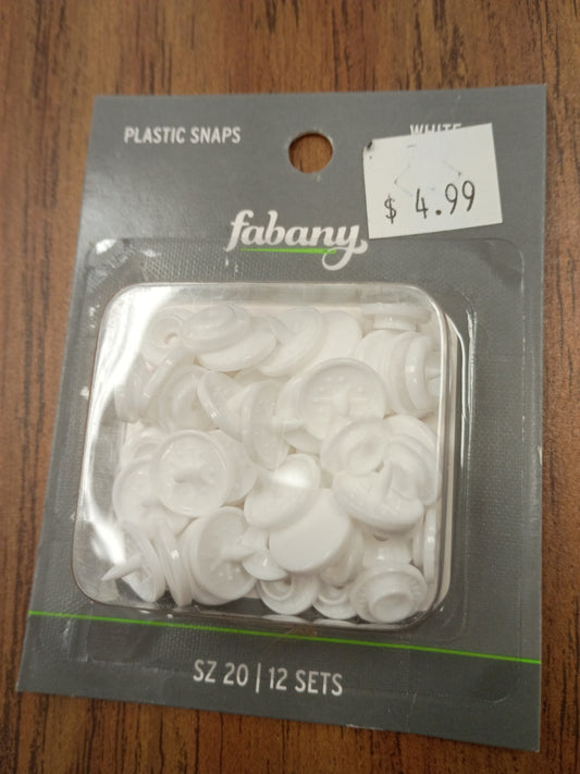 White plastic snaps