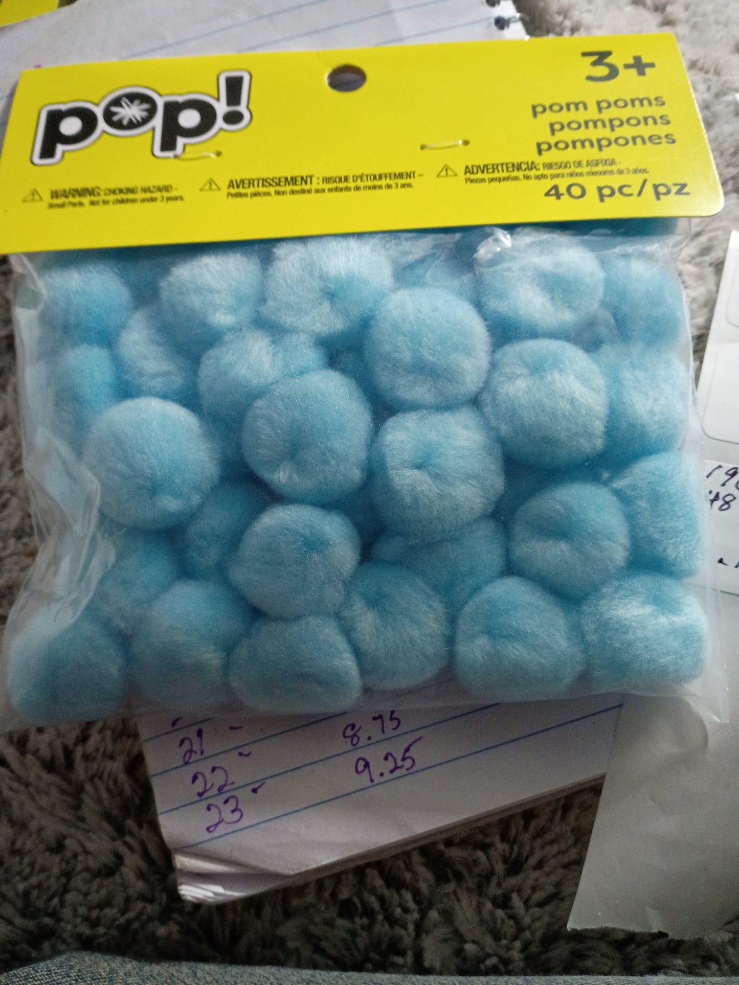 light blue, fluffy pom-poms